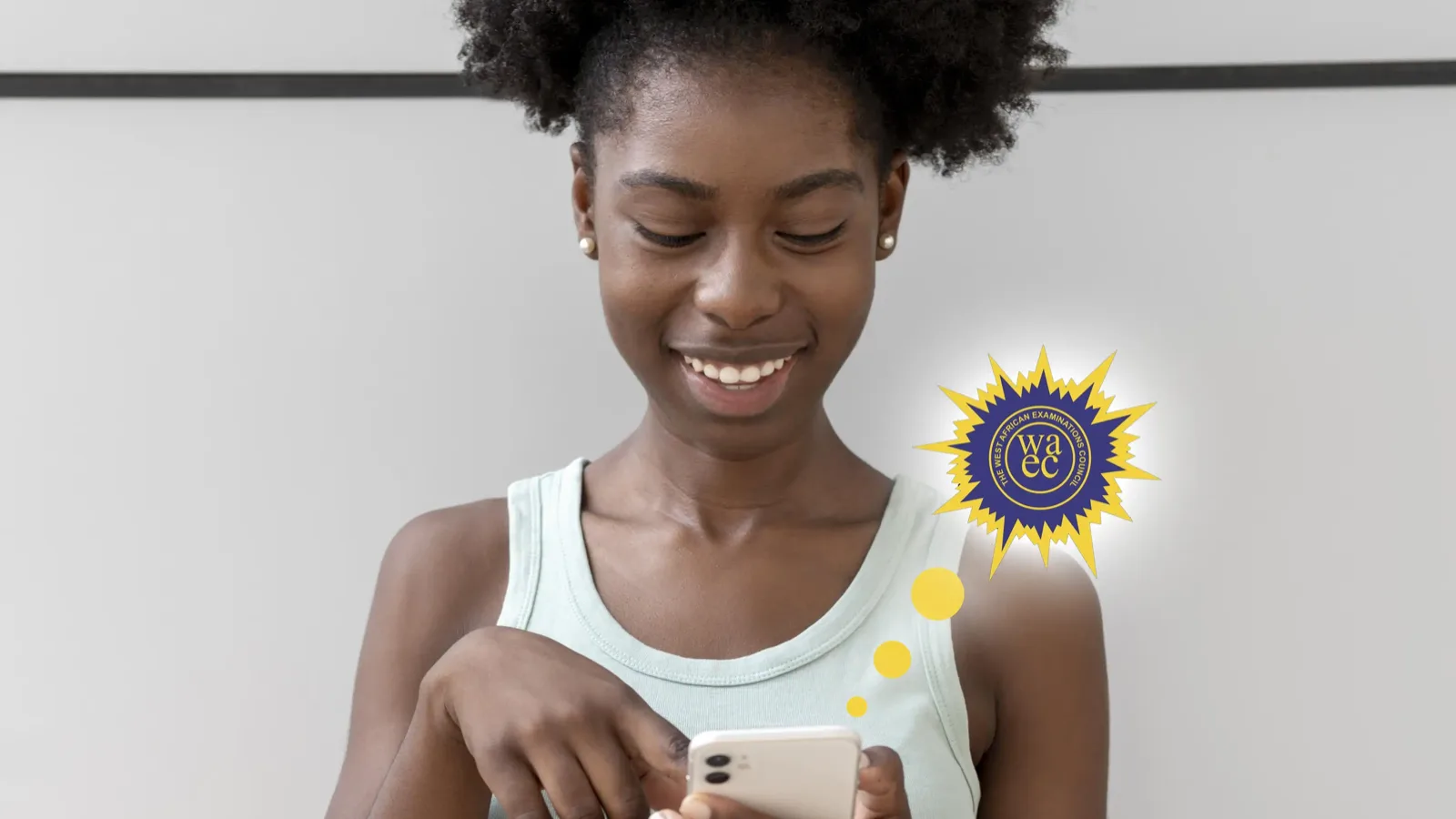 Student smiling at her phone while buying a WAEC result checker on WhatsApp